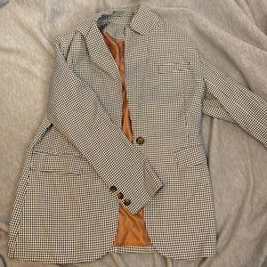 Black and white checkered blazer, brown inside layer